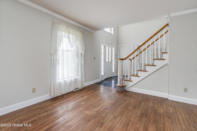 987 Grooms Rd, Rexford, NY 12148 - foyer entrance featuring hardwood / wood-style flooring, stairs, baseboards, and ornamental molding