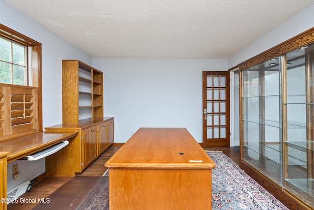 987 Grooms Rd, Rexford, NY 12148 - unfurnished office featuring dark wood finished floors and a textured ceiling
