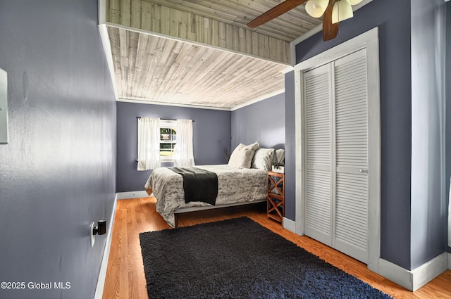 784 Ny Highway 351, Poestenkill, NY 12140 - bedroom with baseboards, a closet, and wood finished floors
