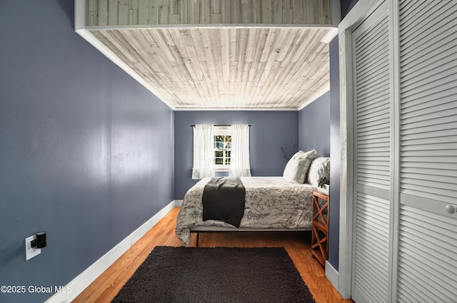 784 Ny Highway 351, Poestenkill, NY 12140 - bedroom featuring baseboards, ornamental molding, wood finished floors, and a closet