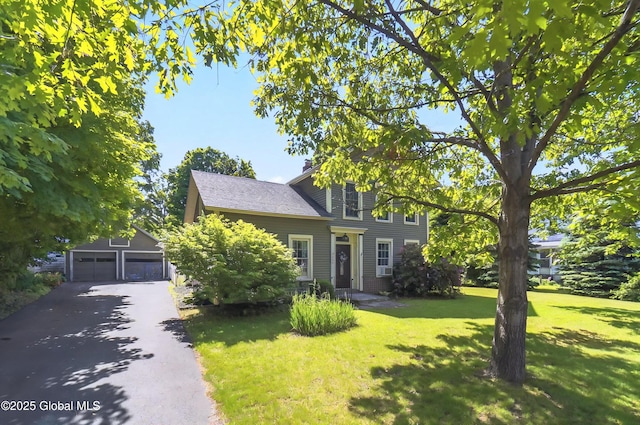 784 Ny Highway 351, Poestenkill, NY 12140 - view of front of home featuring a garage, a front lawn, an outdoor structure, and roof with shingles