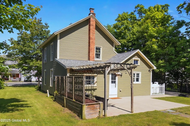 784 Ny Highway 351, Poestenkill, NY 12140 - back of house with a pergola, a shingled roof, a patio area, and a chimney
