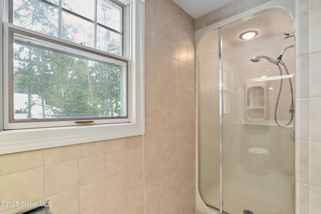 20 Darroch Rd, Bethlehem, NY 12054 - bathroom with a shower stall, healthy amount of natural light, and a baseboard heating unit