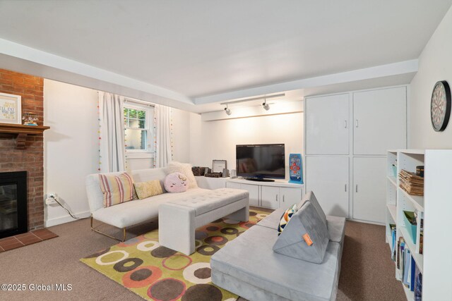 20 Darroch Rd, Bethlehem, NY 12054 - carpeted living room with a brick fireplace and track lighting
