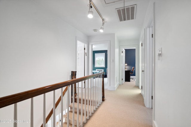 20 Darroch Rd, Bethlehem, NY 12054 - hall with attic access, an upstairs landing, and light carpet