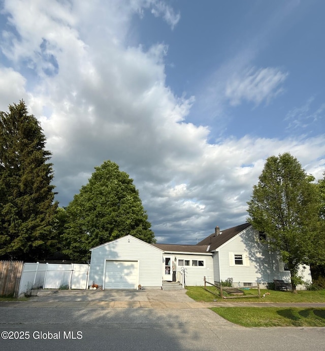 51 Coleman Ave, Hudson Falls, NY 12839 - view of front facade featuring entry steps and an attached garage