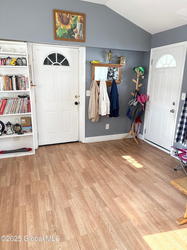 51 Coleman Ave, Hudson Falls, NY 12839 - entryway featuring wood finished floors, vaulted ceiling, and baseboards