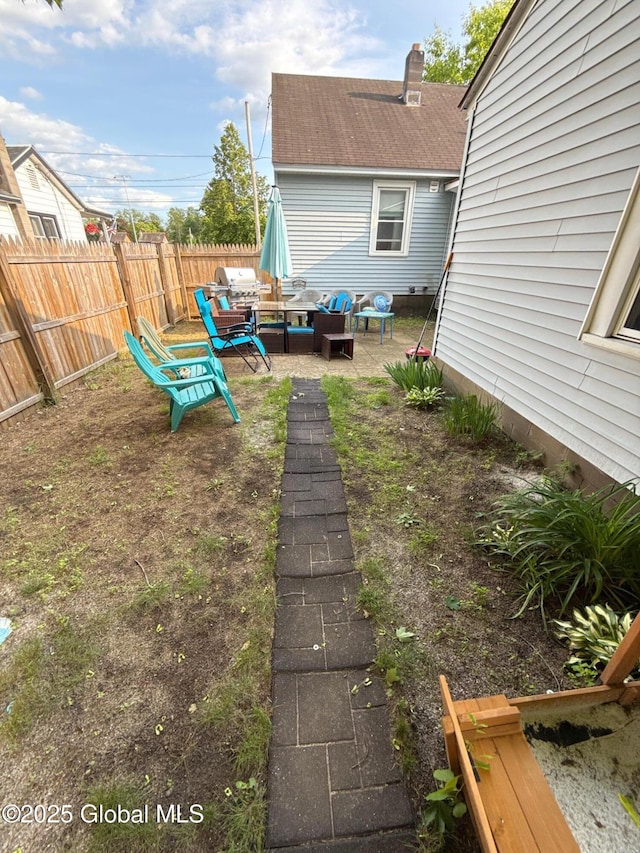 51 Coleman Ave, Hudson Falls, NY 12839 - fenced yard with outdoor lounge area and a patio area