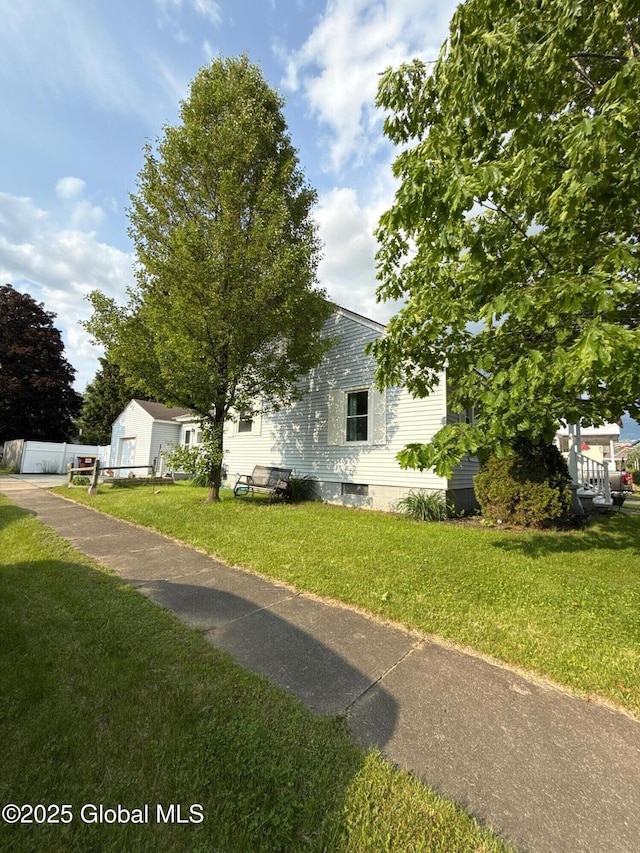 51 Coleman Ave, Hudson Falls, NY 12839 - view of front facade featuring a front yard