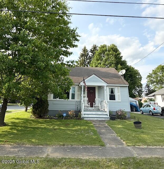 51 Coleman Ave, Hudson Falls, NY 12839 - bungalow with a front lawn