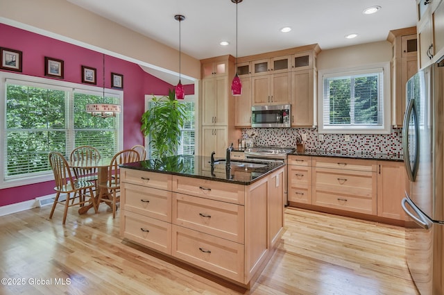 9 Oakline Ct, Niskayuna, NY 12309 - kitchen featuring stainless steel appliances, light brown cabinetry, light wood-type flooring, dark stone counters, and recessed lighting