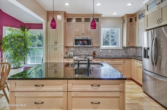 9 Oakline Ct, Niskayuna, NY 12309 - kitchen with appliances with stainless steel finishes, healthy amount of natural light, a sink, dark stone countertops, and recessed lighting