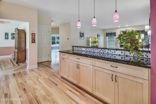 9 Oakline Ct, Niskayuna, NY 12309 - kitchen featuring light brown cabinets, light wood-style floors, dark stone counters, decorative light fixtures, and recessed lighting