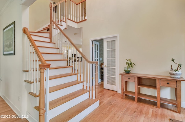 6 Hilander Dr, Colonie, NY 12211 - stairs featuring wood finished floors and baseboards