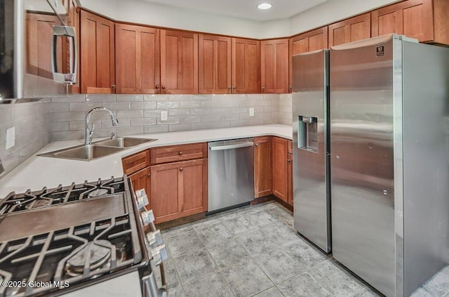 14 Woodridge Rd, Bethlehem, NY 12054 - kitchen with appliances with stainless steel finishes, brown cabinets, light countertops, tasteful backsplash, and recessed lighting