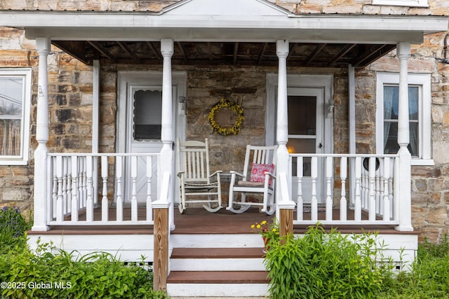 98 George St, Fort Ann, NY 12827 - doorway to property featuring a porch and stone siding