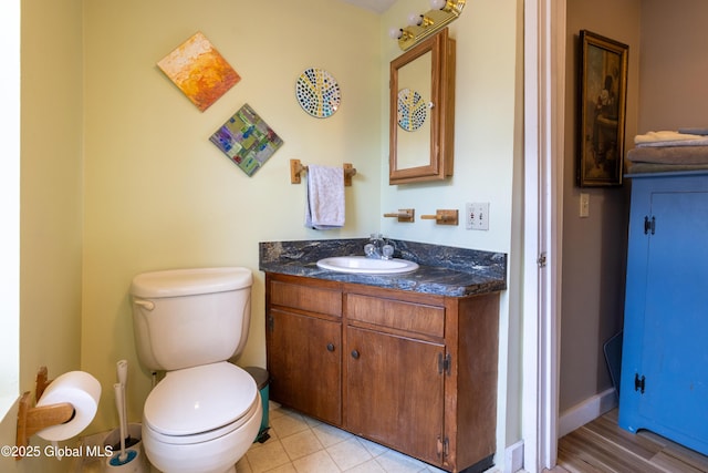 98 George St, Fort Ann, NY 12827 - bathroom featuring vanity, toilet, and baseboards