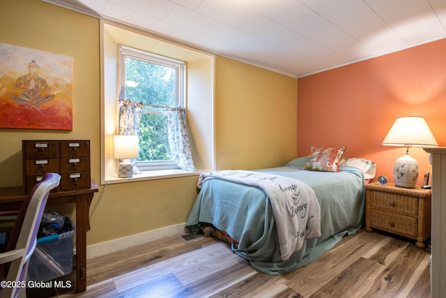 98 George St, Fort Ann, NY 12827 - bedroom featuring wood finished floors, ornamental molding, and baseboards