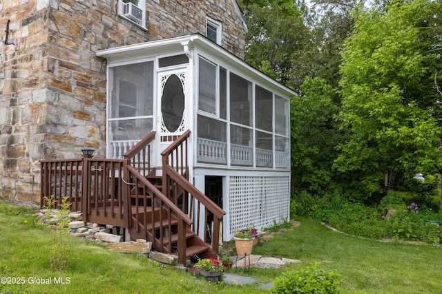 98 George St, Fort Ann, NY 12827 - doorway to property featuring stone siding, a lawn, and cooling unit