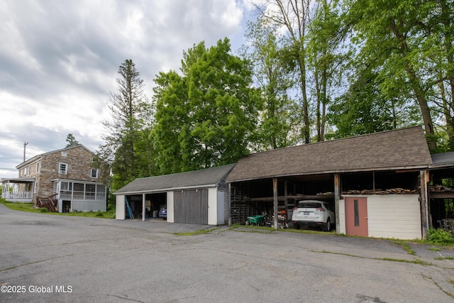 98 George St, Fort Ann, NY 12827 - garage featuring a carport