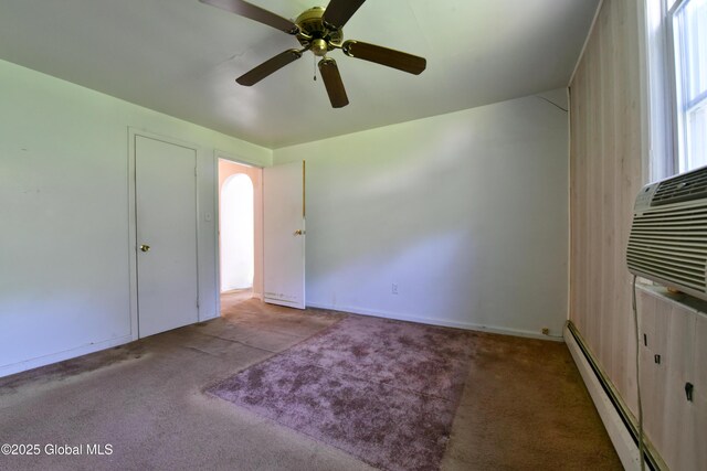 102 Willow St, Guilderland, NY 12084 - unfurnished bedroom with carpet flooring, a baseboard heating unit, baseboards, and ceiling fan