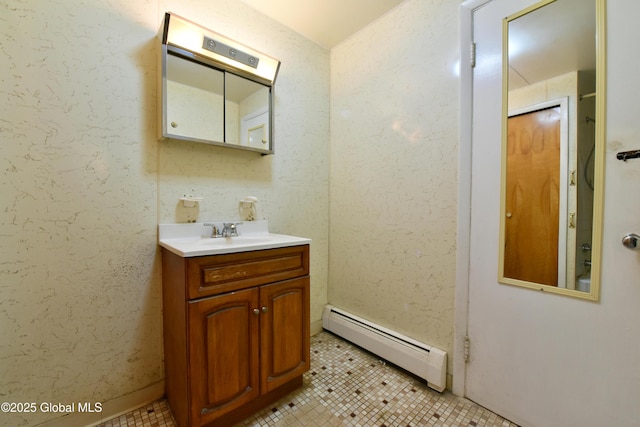 102 Willow St, Guilderland, NY 12084 - bathroom featuring a baseboard radiator, vanity, and tile patterned flooring