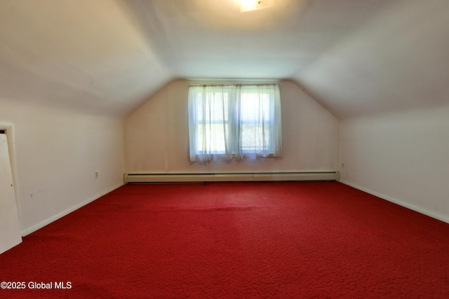 102 Willow St, Guilderland, NY 12084 - bonus room featuring baseboard heating, vaulted ceiling, carpet, and baseboards