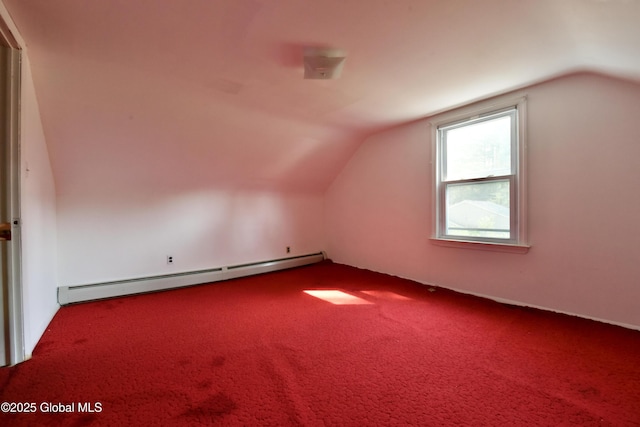 102 Willow St, Guilderland, NY 12084 - bonus room with a baseboard heating unit, lofted ceiling, and dark carpet