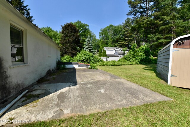 102 Willow St, Guilderland, NY 12084 - view of green lawn featuring a patio area