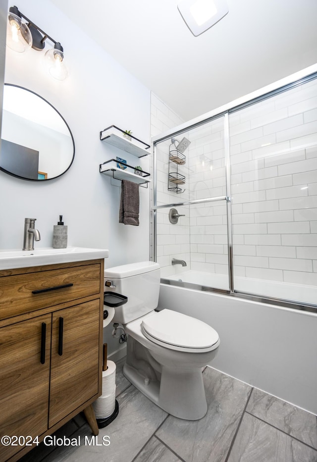 72 Hunter Dr Unit L5, Hunter, NY 12442 - full bath featuring toilet, vanity, and bath / shower combo with glass door