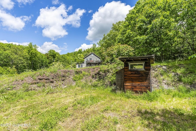 19 Knowles Rd, Rensselaerville, NY 12469 - view of yard featuring a forest view