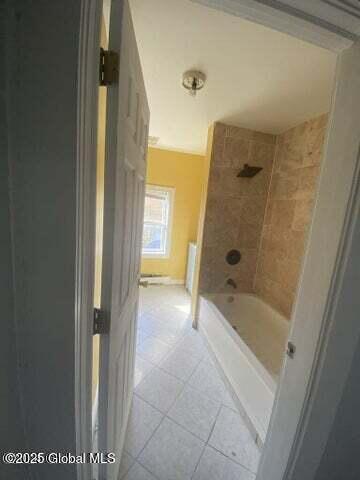 225 Main St, Fort Plain, NY 13339 - full bath featuring tile patterned flooring and shower / bath combination