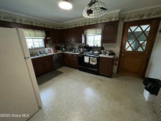 11 Calhoun Rd, Brunswick, NY 12180 - kitchen with freestanding refrigerator, black electric range, dishwasher, light countertops, and a sink