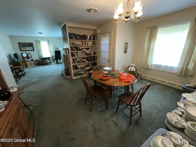 11 Calhoun Rd, Brunswick, NY 12180 - dining room featuring a baseboard heating unit, carpet floors, and a chandelier