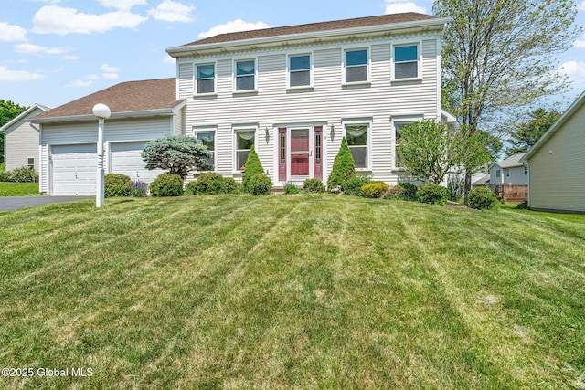 19 Runnel Dr, Colonie, NY 12304 - view of front facade with driveway, a garage, and a front yard