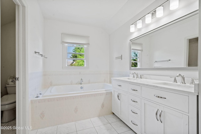 19 Runnel Dr, Colonie, NY 12304 - bathroom with toilet, double vanity, a garden tub, and tile patterned flooring