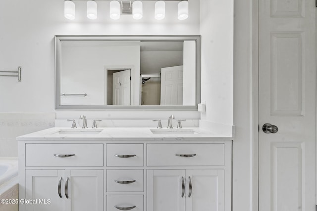 19 Runnel Dr, Colonie, NY 12304 - bathroom with tiled bath and double vanity