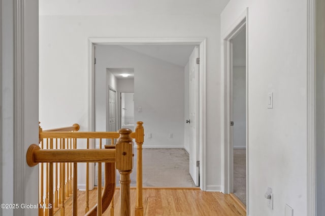 19 Runnel Dr, Colonie, NY 12304 - hall with an upstairs landing, light wood-type flooring, baseboards, and vaulted ceiling