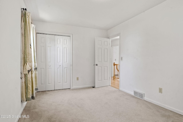 19 Runnel Dr, Colonie, NY 12304 - unfurnished bedroom with carpet, baseboards, and a closet