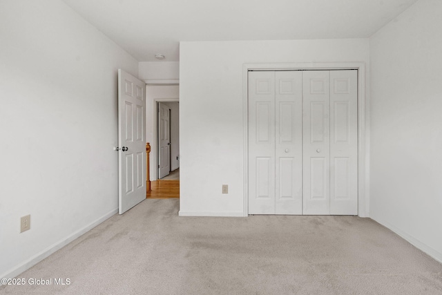 19 Runnel Dr, Colonie, NY 12304 - unfurnished bedroom featuring carpet, baseboards, and a closet