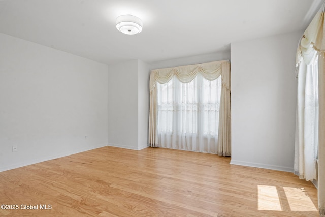 19 Runnel Dr, Colonie, NY 12304 - unfurnished room with light wood-style flooring and baseboards