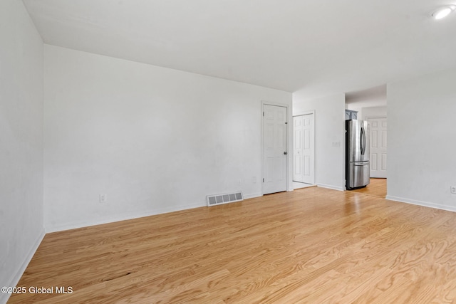 19 Runnel Dr, Colonie, NY 12304 - empty room with light wood-type flooring and baseboards