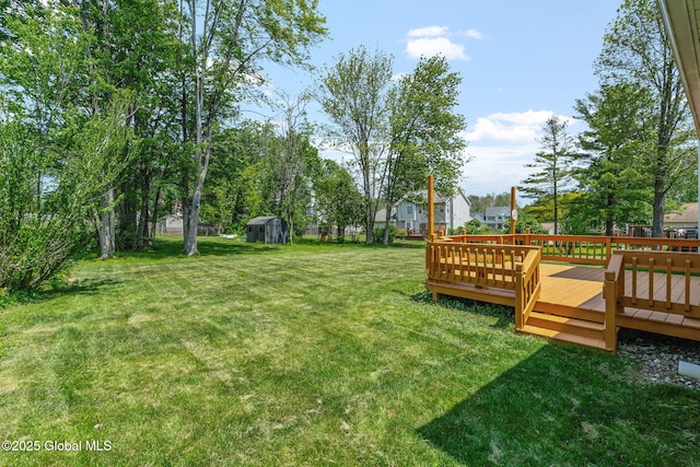 19 Runnel Dr, Colonie, NY 12304 - view of grassy yard featuring a wooden deck