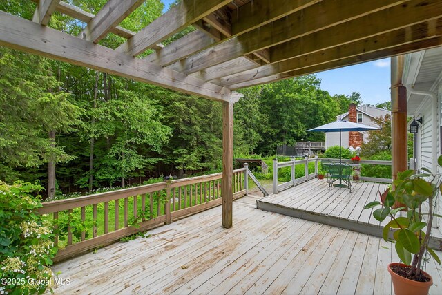 21 Hemlock Dr, Greenfield, NY 12833 - deck with outdoor dining space and a pergola