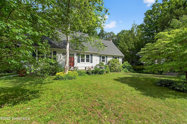 21 Hemlock Dr, Greenfield, NY 12833 - cape cod-style house with a front lawn