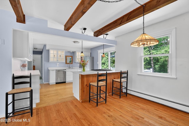 21 Hemlock Dr, Greenfield, NY 12833 - kitchen with baseboard heating, freestanding refrigerator, stainless steel dishwasher, white cabinets, and light wood finished floors