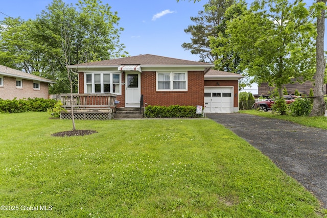 51 Tryon Ct, Albany, NY 12203 - view of front of property with a garage, driveway, a front yard, and brick siding