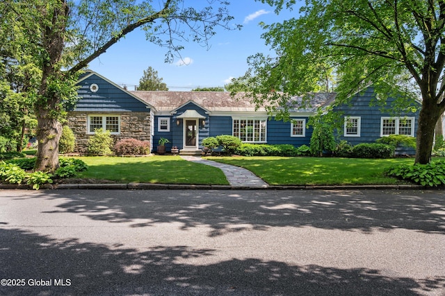 38 Horicon Ave, Glens Falls, NY 12801 - view of front of property featuring a front yard and stone siding