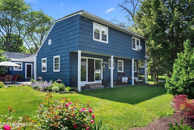 38 Horicon Ave, Glens Falls, NY 12801 - back of house with a lawn and a patio