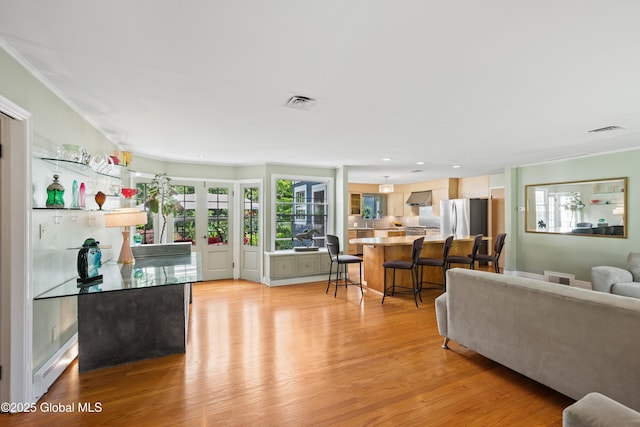 38 Horicon Ave, Glens Falls, NY 12801 - living area featuring light wood-style flooring, french doors, and recessed lighting